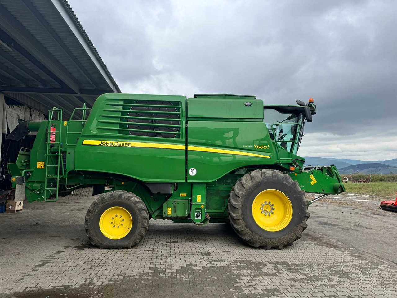 JOHN DEERE T660I - Kombinovani kombajn: slika 1 JOHN DEERE T660I - Kombinovani kombajn: slika 1
