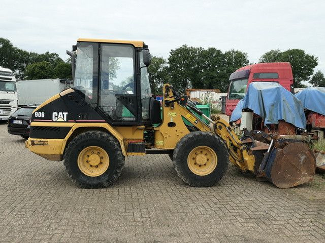 CAT 906, Hydr. S.W.S., Greifschaufel, - Utovarivač točkaš: slika 2 CAT 906, Hydr. S.W.S., Greifschaufel, - Utovarivač točkaš: slika 2