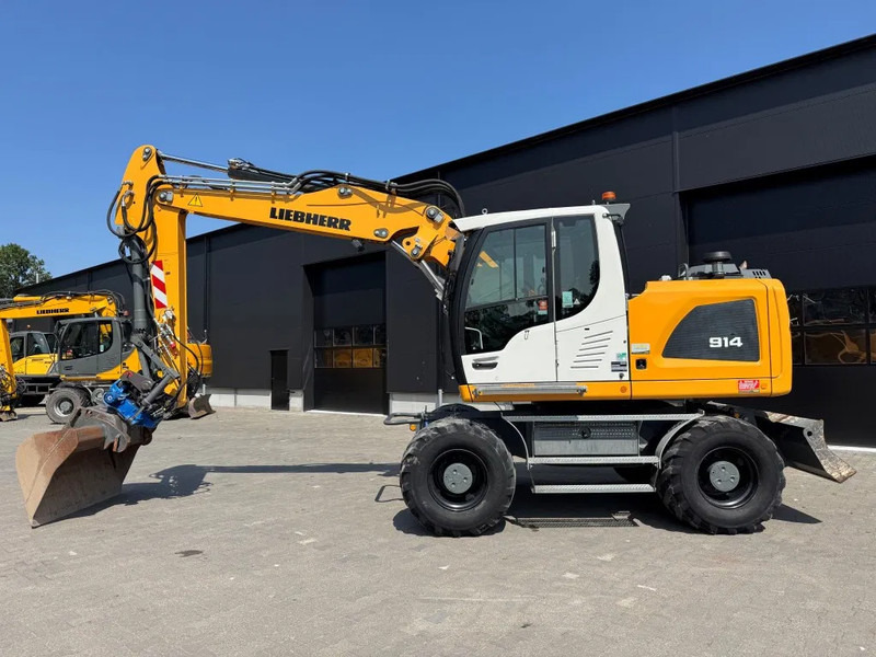 Liebherr A914 2019 7300 uur !! NL MACHINE !! - Bager točkaš: slika 1 Liebherr A914 2019 7300 uur !! NL MACHINE !! - Bager točkaš: slika 1