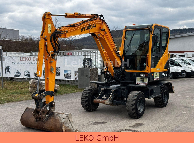 Hyundai Robex 55W-9A Mit Drei Löffeln - Bager točkaš: slika 3 Hyundai Robex 55W-9A Mit Drei Löffeln - Bager točkaš: slika 3