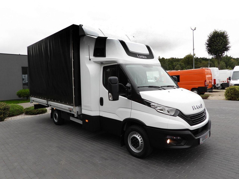 Iveco DAILY 35S18 PLANDEKA 10 PALET WEBASTO TEMPOMAT PNEUMATYKA KLIMAT - Dostavno vozilo sa ceradom: slika 4 Iveco DAILY 35S18 PLANDEKA 10 PALET WEBASTO TEMPOMAT PNEUMATYKA KLIMAT - Dostavno vozilo sa ceradom: slika 4