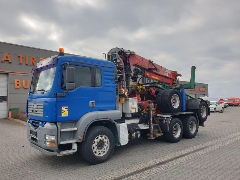 MAN TGA 26.480 6x4 LOGLIFT DOLL WOOD TRANSPORTER - Šticar, Kamion sa dizalicom: slika 1 MAN TGA 26.480 6x4 LOGLIFT DOLL WOOD TRANSPORTER - Šticar, Kamion sa dizalicom: slika 1