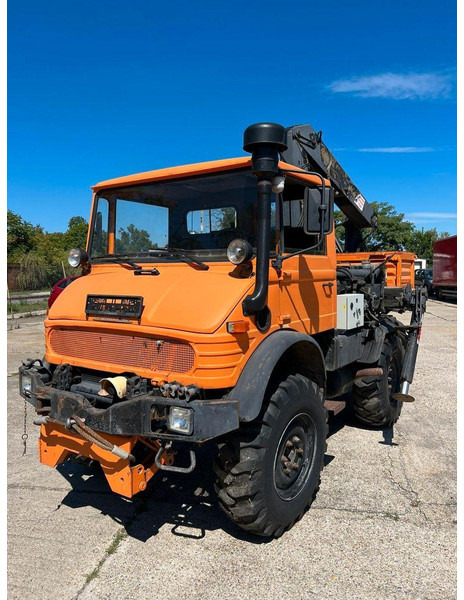Mercedes-Benz UNIMOG - Istovarivač, Kamion sa dizalicom: slika 1 Mercedes-Benz UNIMOG - Istovarivač, Kamion sa dizalicom: slika 1