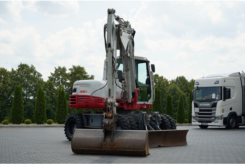 Takeuchi TB 295 W / KOPARKA KOŁOWA / 2016 ROK / PO KONTRAKCIE SERWISOWYM - Bager točkaš: slika 5 Takeuchi TB 295 W / KOPARKA KOŁOWA / 2016 ROK / PO KONTRAKCIE SERWISOWYM - Bager točkaš: slika 5