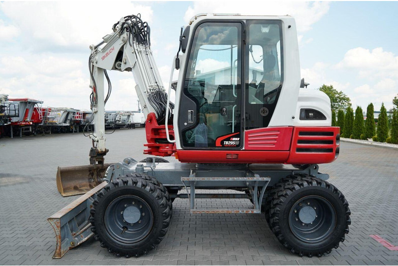Takeuchi TB 295 W / KOPARKA KOŁOWA / 2016 ROK / PO KONTRAKCIE SERWISOWYM - Bager točkaš: slika 2 Takeuchi TB 295 W / KOPARKA KOŁOWA / 2016 ROK / PO KONTRAKCIE SERWISOWYM - Bager točkaš: slika 2