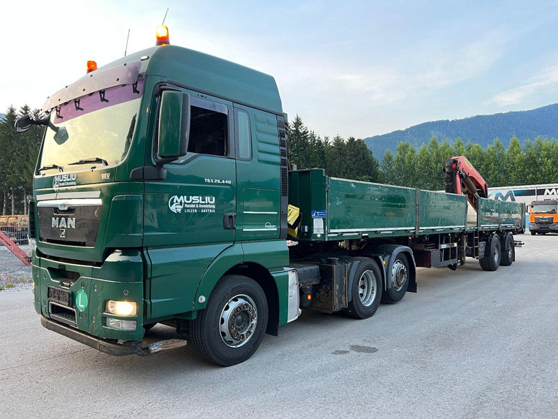 MAN TGX 26.440 6x2 + Flatbed semi trailer + Crane PK26002 - Tegljač: slika 1 MAN TGX 26.440 6x2 + Flatbed semi trailer + Crane PK26002 - Tegljač: slika 1