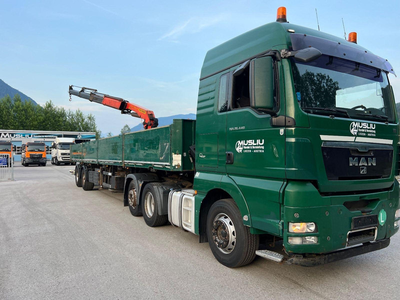MAN TGX 26.440 6x2 + Flatbed semi trailer + Crane PK26002 - Tegljač: slika 2 MAN TGX 26.440 6x2 + Flatbed semi trailer + Crane PK26002 - Tegljač: slika 2