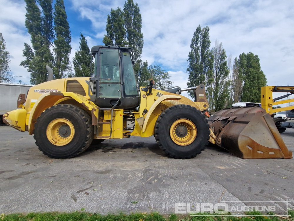 Utovarivač točkaš 2011 New Holland W230C: slika 6