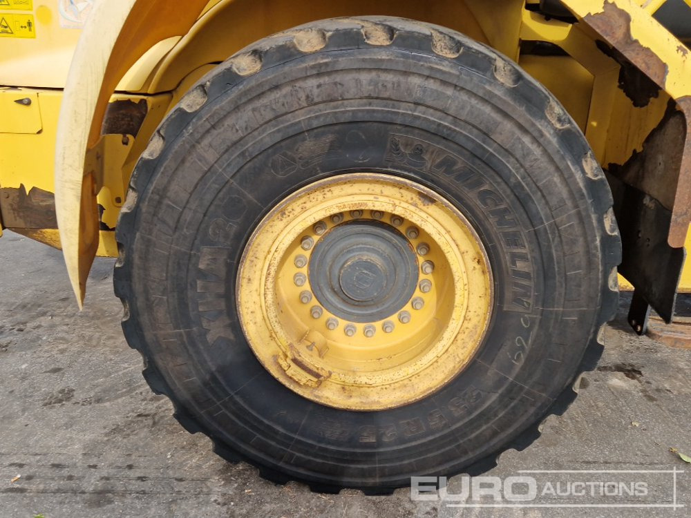 Utovarivač točkaš 2011 New Holland W230C: slika 11