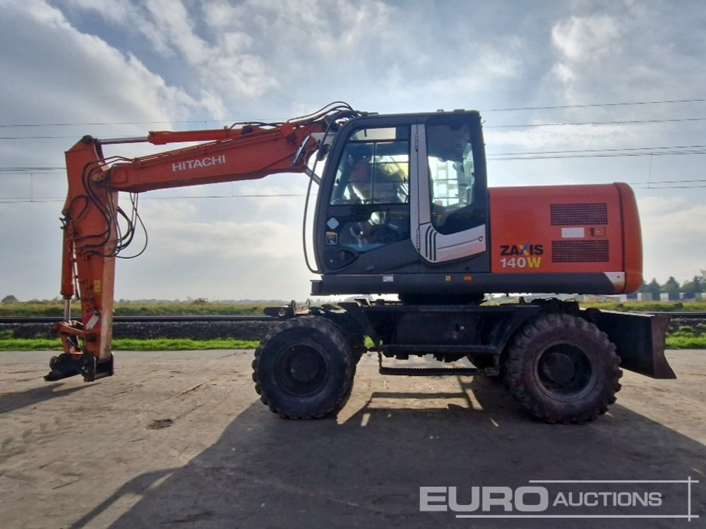 Hitachi ZX140W-3 - Bager točkaš: slika 2 Hitachi ZX140W-3 - Bager točkaš: slika 2