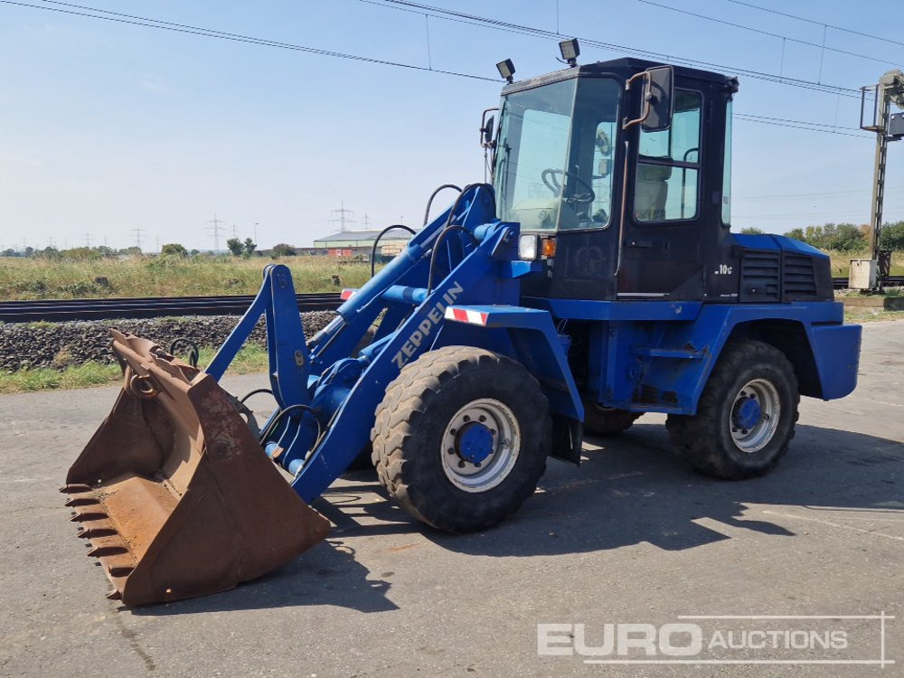 Schaeff ZL100 - Utovarivač točkaš: slika 1 Schaeff ZL100 - Utovarivač točkaš: slika 1