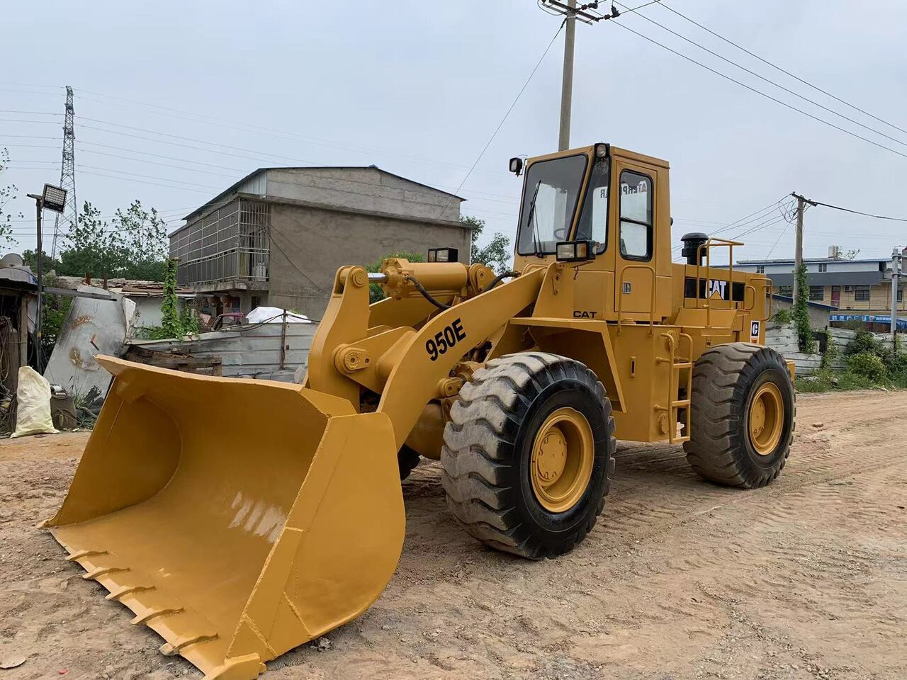 CATERPILLAR 950E - Utovarivač točkaš: slika 1 CATERPILLAR 950E - Utovarivač točkaš: slika 1