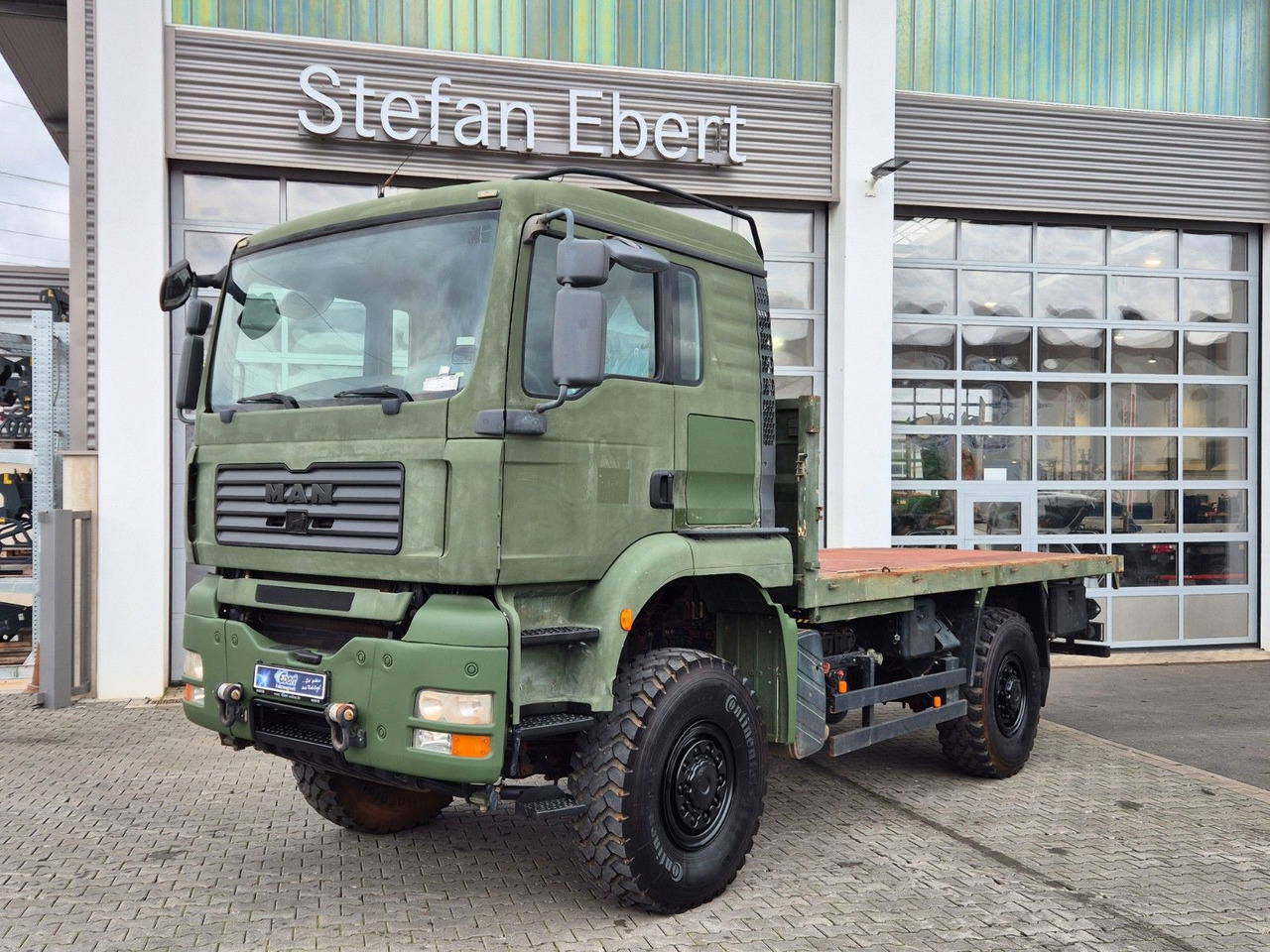 MAN TGA 18.360 4x4 BB Pritsche Single Bereifung - Kamion sa tovarnim sandukom: slika 1 MAN TGA 18.360 4x4 BB Pritsche Single Bereifung - Kamion sa tovarnim sandukom: slika 1