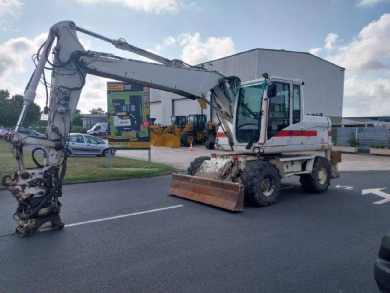 CAT M313D - Bager točkaš: slika 1 CAT M313D - Bager točkaš: slika 1