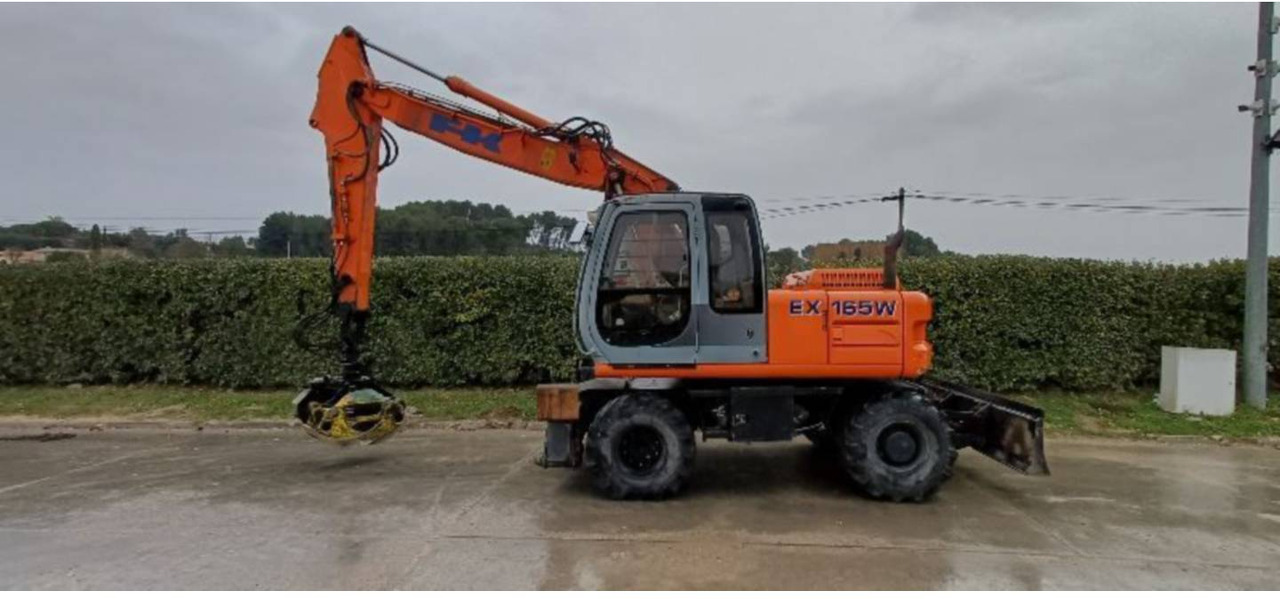 FIAT ALLIS / NEW HOLLAND EX165W - Bager točkaš: slika 1 FIAT ALLIS / NEW HOLLAND EX165W - Bager točkaš: slika 1