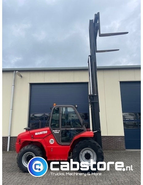 Manitou M 50-4 Turbo offroad forklift 4x4 Ruwterrein heftruck - Bouwjaar 2012 - Freelift - 5 Ton - Terenski viljuškar: slika 4 Manitou M 50-4 Turbo offroad forklift 4x4 Ruwterrein heftruck - Bouwjaar 2012 - Freelift - 5 Ton - Terenski viljuškar: slika 4
