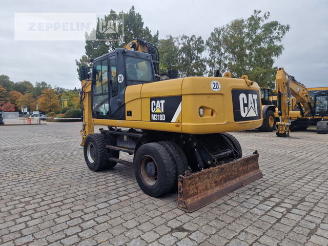 Cat M318D - Bager točkaš: slika 4 Cat M318D - Bager točkaš: slika 4